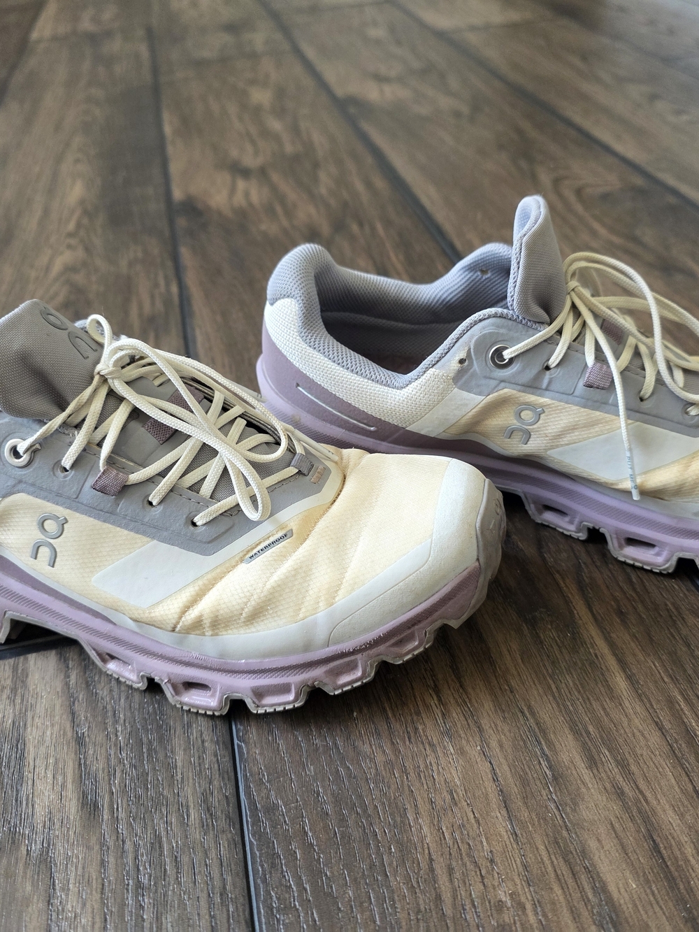 On Running Women's Athletic Shoes in Cream and Lavender